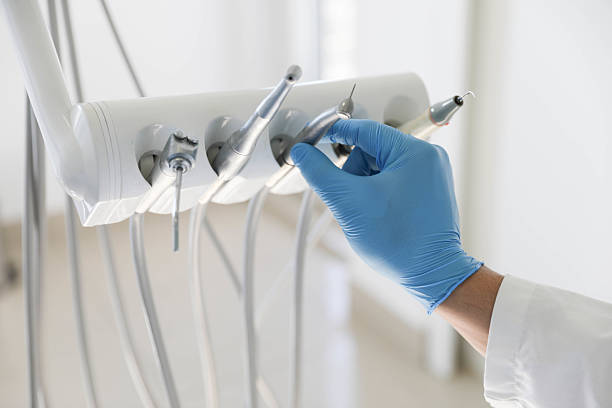 Professional Tooth Extraction technician working in Parma, ID